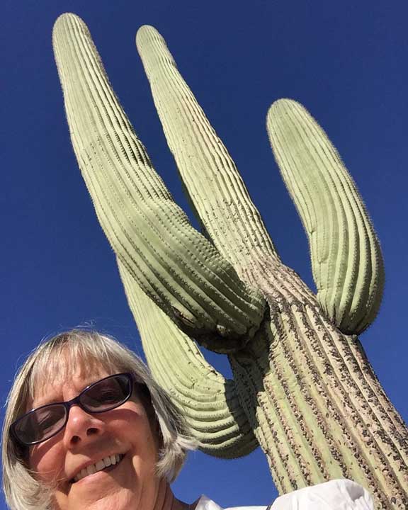selfie in front of saguaro cactus.
