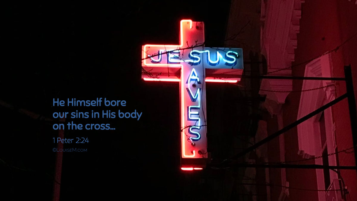 Jesus saves neon cross on dark wall Facebook cover photo with 1 Peter 2:24 verse.