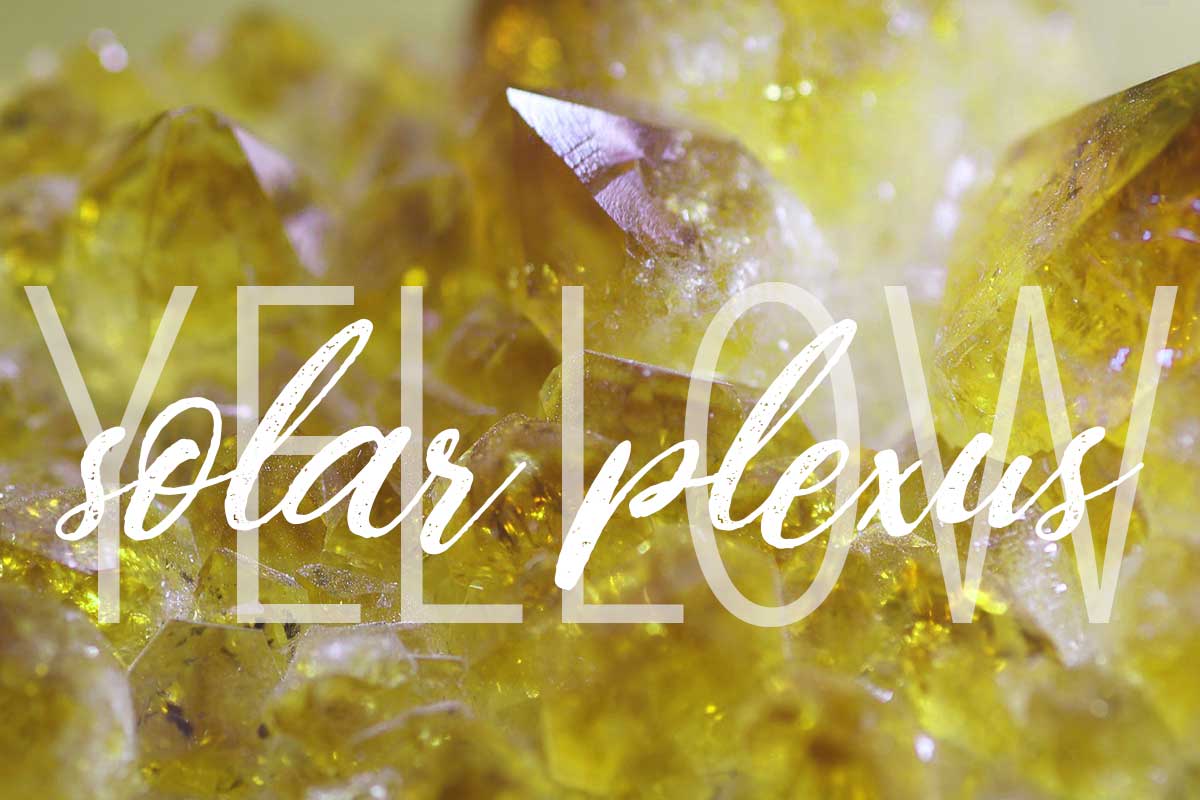 citrine crystal gemstone background says yellow solar plexus.