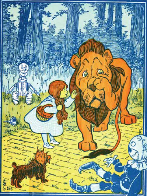 vintage drawing of Dorothy, Toto, and the Cowardly Lion on the yellow brick road.