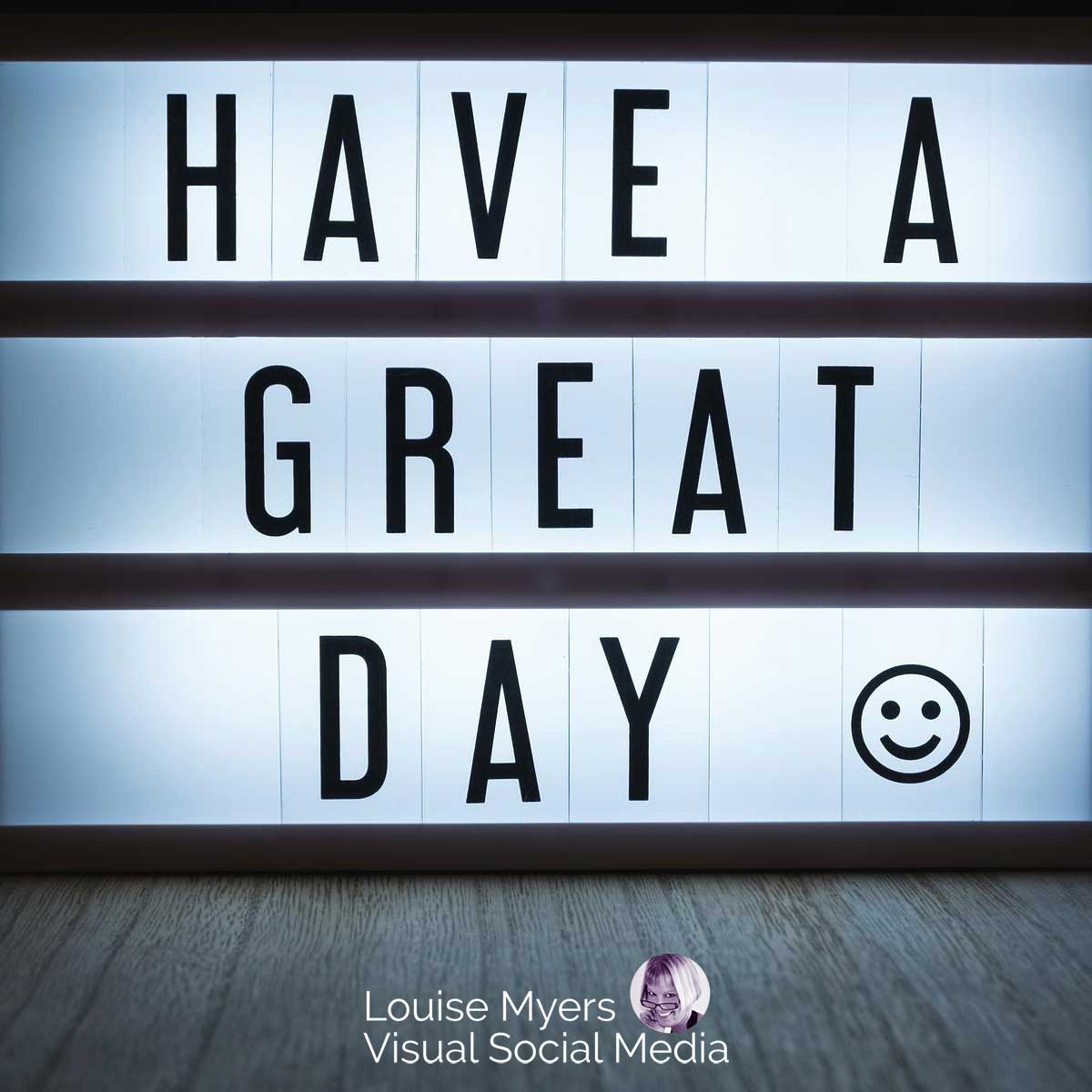 letter lightbox spells out have a great day with smiley face emoji.