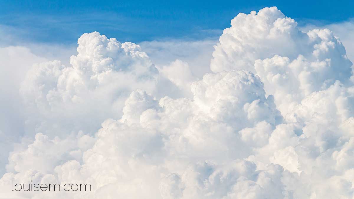 fluffy white clouds look pure and ethereal.